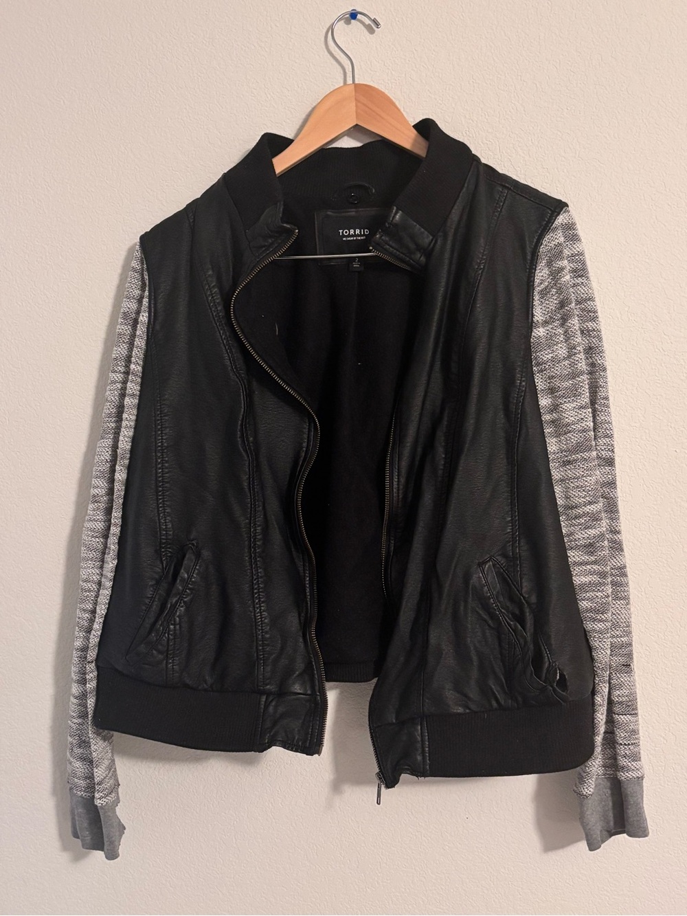 torrid Black Faux Leather Bomber Jacket with Gray Knit Sleeves